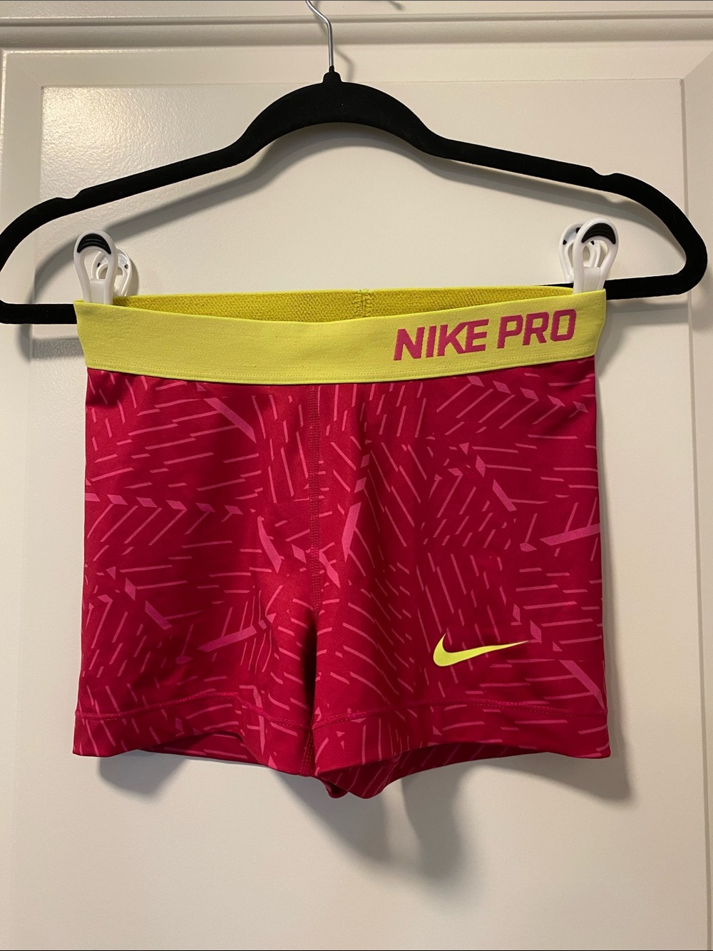 Nike Pink Performance Shorts with Yellow Waistband